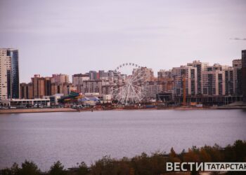 город
