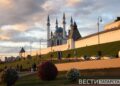 город